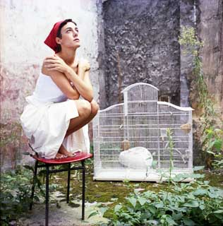 Portrait of Clementine Dupontavice with birdcage for fashion editorial